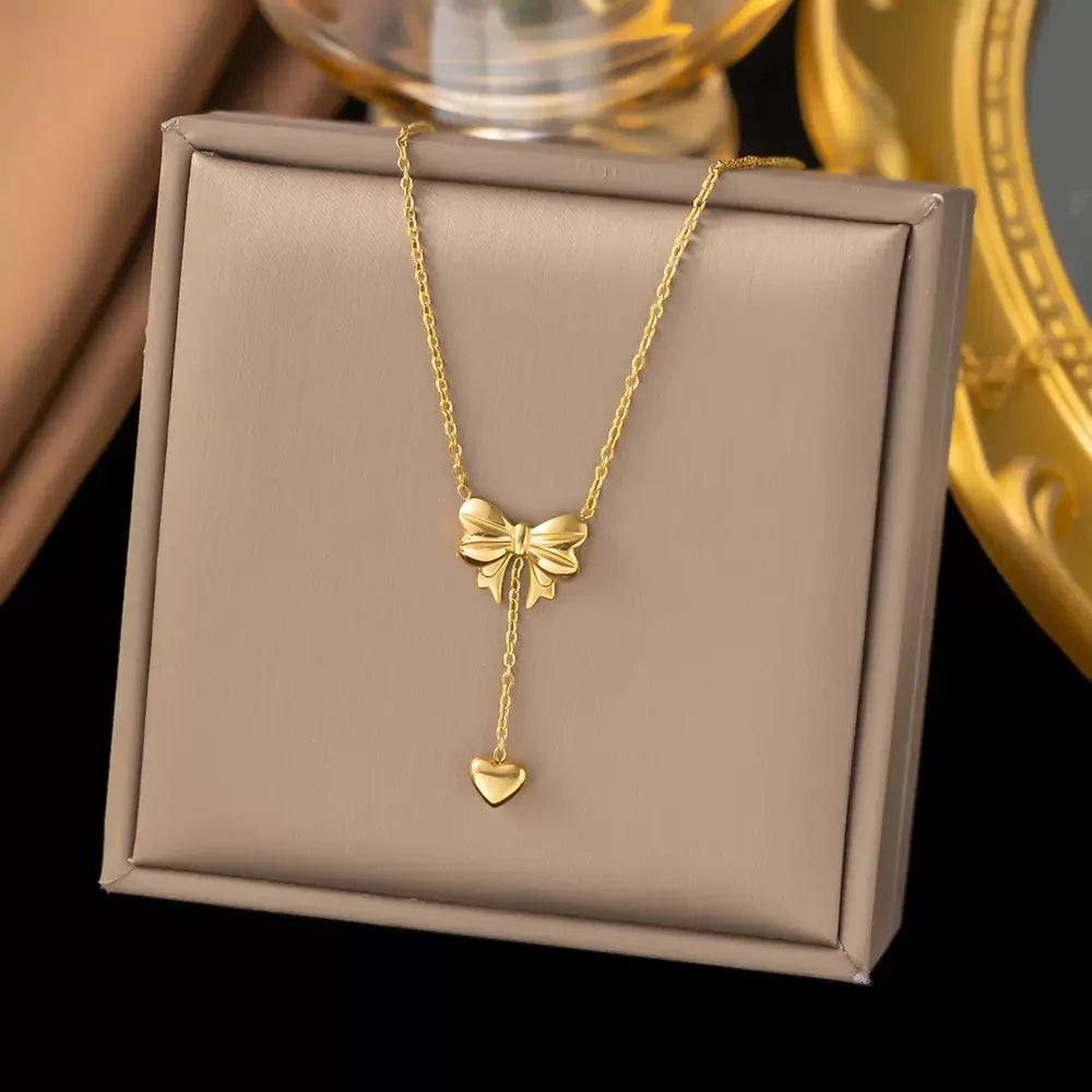 Gold Plated Bow Pendant Necklace with Heart Charm