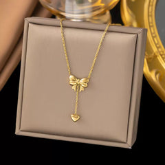 Gold Plated Bow Pendant Necklace with Heart Charm